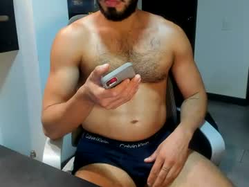 T.